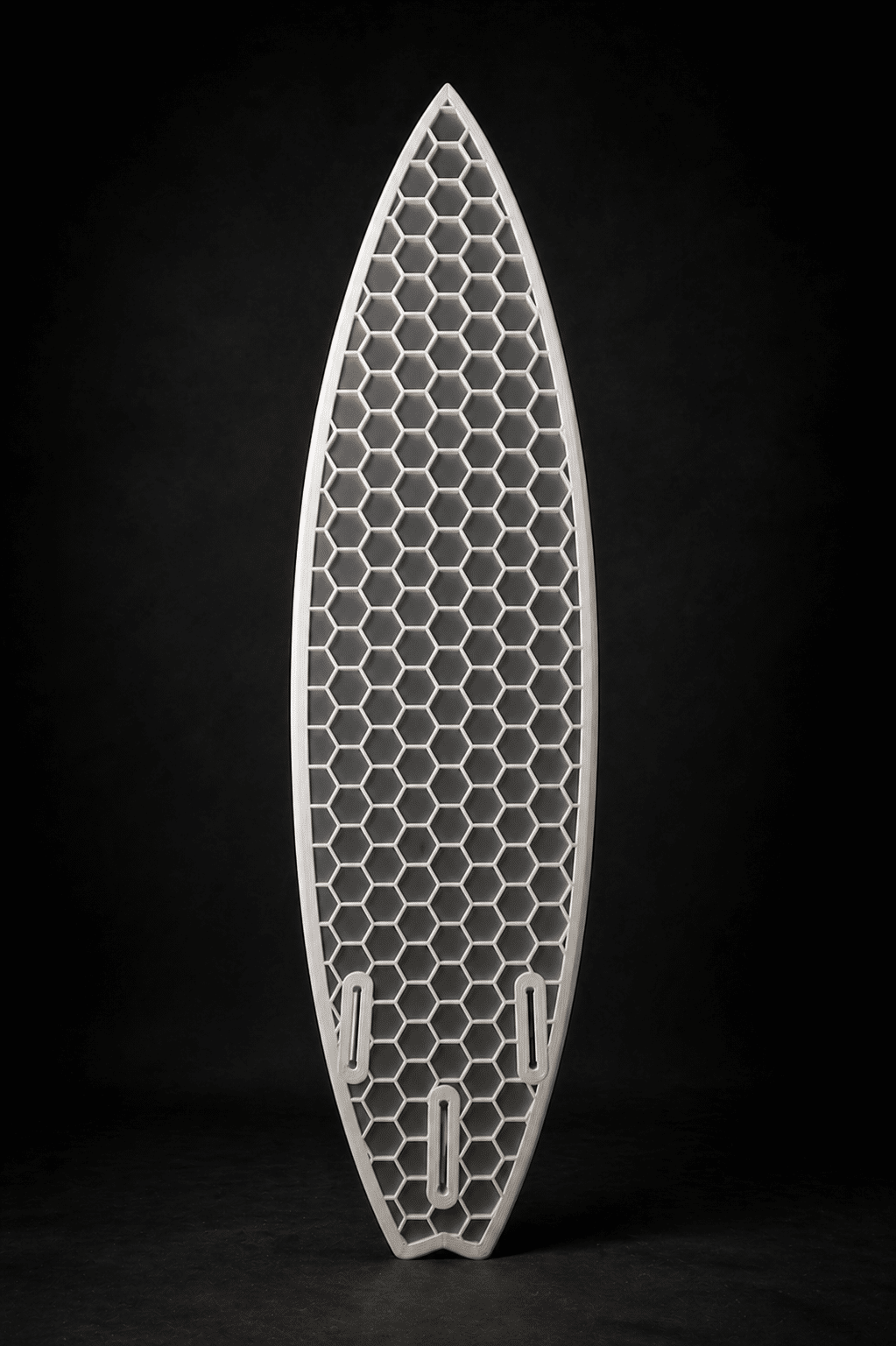 3D printed surfboard with hexagonal lattice design on black background